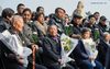 Survivors of the Nanjing Massacre Ge Daorong(1st L, front), Xia Shuqin(2nd L, front), Ai Yiying(1st R, front), and Tao Xiuhua(2nd R, front), the daughter of the newly confirmed victim Zhou Wanrong attend commemoration activities for the victims in Nanjing Massacre by Japanese invaders in Nanjing, capital of east China's Jiangsu Province, Dec. 3, 2019. Starting Tuesday, family members of the victims of the massacre began a series of commemoration activities such as laying flowers and burning incense before the memorial wall where the victims' names are engraved. The Nanjing Massacre took place when Japanese troops captured the city, then China's capital, on Dec. 13, 1937. Over six weeks, they killed 300,000 Chinese civilians and unarmed soldiers. In February 2014, China's top legislature designated December 13 as the national memorial day for victims of the Nanjing Massacre. Family members of the victims also started to hold commemoration activities at the memorial hall in December of the same year. (Xinhua/Li Bo)