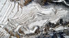 2019年01月31日，山西运城，从高空俯瞰，纵横的沟壑和蜿蜒的梯田在白雪的映衬下，粗犷中显现出一种别样的柔美。