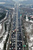 2019年2月10日，大批车辆行驶在南京二桥高速公路上，绵延数公里。当日是中国春节假期最后一天，各地迎来返程高峰。孟德龙/视觉中国
