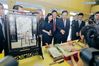 Chinese Ambassador to Cambodia Wang Wentian (Center, R) visits a booth exhibiting Wuxi fine embroidery during the “Perceiving China-Jiangsu Culture Week” in Phnom Penh, Cambodia, on Feb. 18, 2019. “Perceiving China-Jiangsu Culture Week” kicked off here on Monday, aiming at strengthening cultural exchanges and enhancing friendship between China and Cambodia. (Xinhua/Phearum)