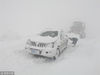 2019年2月21日，西藏阿里，武警冒着暴雪救援实施车辆。