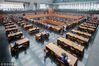 2019年2月7日，读者在位于北京的中国国家图书馆阅读大厅看书学习。