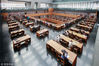 2019年2月7日，读者在位于北京的中国国家图书馆阅读大厅看书学习。