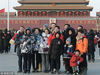 2019年2月7日，北京，大年初三，受冷空气影响气温骤降，寒风中游客包裹严实在天安门广场游览拍照，热情不减。