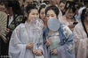 2019年3月16日，武汉，园博园花朝节开幕，民众着传统服装参加活动推广传统文化。