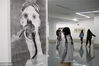 2019年3月23日，江苏苏州，观众在第四届国际高等艺术学院青年绘画展上参观。