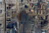 2019年3月23日，“3.21”江苏盐城市响水县陈家港化工园爆炸核心区，现场明火已被扑灭，现场露出直径超过百米的的大水坑。 同时，在一处废墟附近还有少量消防车在洒水作业。
