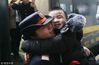 A boy hugs his mother tightly as he only has three minutes to meet her when the train parks on the platform in Hehang Station, Central China's Hunan province, Feb 10, 2018. [Photo/VCG]
Pressures could result in problems further down the line. Li Hongyang reports.

In 2016, the government introduced the second-child policy, which allowed every couple to have two children. The move was aimed at reversing the decline in the nation's workforce.

However, as the policy really begins to have an impact, women who want to have a second child are subject to greater pressure from both employers and families, according to experts and employment market reports.

Those pressures may result in fewer women entering the job market, which could prompt an economic slowdown, they said.

Data from the World Bank show that the participation rate of China's female labor force was 73.2 percent in 1990, but fell to 60.9 percent last year－still above the global average.