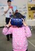 A child tries the VIVE VR glasses at the AI Expo 2019 in Suzhou, East China's Jiangsu province, on May 9, 2019. [Photo/VCG]