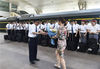 2019年6月14日，济南客运段Z106车车长张伟华在济南火车站4站台准备退乘时，他的妻子王焕芝手捧鲜花来站台迎接。