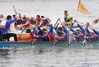 People take part in a dragon boat race on Nanshan Lake in Tongzhou District of Nantong, east China's Jiangsu Province, June 22, 2019. A total of 19 dragon boat teams from cities along the Yangtze River Economic Belt participated in the dragon boat race on Saturday. A mass fitness event was also held here at the same day. (Xinhua/Xu Congjun)