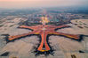 2019年5月29日傍晚，中国，北京，即将竣工的北京大兴国际机场夜景图片。本图为航站楼夜景航拍，南向北方向拍摄的航站楼全景图片。度秋/视觉中国