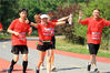 Over 300 people joined a half-marathon race named after the Ancient Weir of Hongze Lake in Hongze District, Huai’an City, on June 23, which also marked the Olympic Day Run.