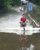 2019年7月15日，广西柳州，鱼峰区白沙镇一条乡道被柳江倒灌洪水淹没。来源：黎寒池/视觉中国