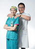 Sun Xueqin (R), assistant research fellow of affair management office of west campus of the Peking Union Medical College Hospital, and his wife Zhang Xue, resident doctor of anesthesiology department, pose for a photo at their work place of the Peking Union Medical College Hospital in Beijing, capital of China, Aug. 13, 2019.