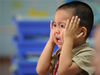 2011年09月01日，天津开发区泰达一幼新生正式入学。教室内一名孩子正在哭泣。小小/视觉中国