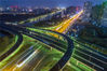 2019年9月11日，江苏省淮安市翔宇大道与建设中的八亭桥内环高架立交桥的灯光夜景（无人机拍摄）。