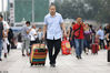 2019年9月13日，北京，中国传统的中秋节，旅客携带行李准备乘坐火车回家过节。