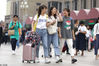 2019年9月13日，北京，中国传统的中秋节，旅客携带行李准备乘坐火车回家过节。