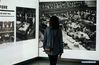 A visitor views a photo exhibition marking the 71st anniversary of the Tokyo Trial's judgment and sentence of Japanese war criminals during World War II at the Memorial Hall of the Victims in Nanjing Massacre by Japanese Invaders in Nanjing, east China's Jiangsu Province, Sept. 18, 2019. The photo exhibition opened here on Wednesday and will last till March 2020. 