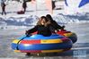 1月18日，游客在新疆天池景区玩电动碰碰车。新华社记者 沙达提 摄