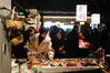 Young people look at some handcrafted items at Shuangta Market in Suzhou, Jiangsu province, Jan 5, 2020. [Photo/Xinhua]