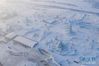 这是第二十一届哈尔滨冰雪大世界园区（无人机照片，2019年12月23日摄）。 进入冬季以来，“冰城”哈尔滨换上“冰雪新装”，向来自世界各地的游客展现浪漫绚丽的冰雪奇观。 新华社发（谢剑飞 摄）