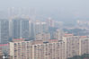 2020年10月10日，中国北京，北京迎来2020入秋后首轮空气污染过程，京城灰蒙蒙，预计11日上午本轮污染过程结束。图为北京住宅楼宇、商务楼等建筑被灰霾笼罩。来源：IC photo 