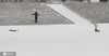 2018年2月1日，黑龙江省哈尔滨市，当松花江冰封雪掩之时，北国冰城之美溢出。松花江上，相约看雪的情侣，相携而行；在萧萧北风凛凛严寒中，情如冰般坚实。