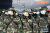 2月17日，一批军队支援湖北医疗队员抵达武汉天河机场。新华社记者贾启龙摄