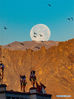 A super moon is pictured in Lhasa, southwest China's Tibet Autonomous Region, March 10, 2020. (Xinhua/Purbu Zhaxi)