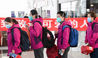 Medical staffers from northwest China's Xinjiang Uygur Autonomous Region line up to board a plane at the Wuhan Tianhe International Airport, in Wuhan, central China's Hubei Province, March 17, 2020. Some medical assistance teams started leaving Hubei Province on Tuesday as the epidemic outbreak in the hard-hit province has been subdued. (Xinhua/Chen Yehua)

