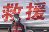 A national emergency medical rescue team member prepares to leave Wuhan, central China's Hubei Province, March 17, 2020. Members of 15 national emergency medical rescue teams departed Hubei Province on Tuesday as the epidemic outbreak in the hard-hit province has been subdued. (Xinhua/Cai Yang)