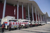 National emergency medical rescue team members and vehicles gather in front of a temporary hospital in Wuhan, central China's Hubei Province, March 17, 2020. Members of 15 national emergency medical rescue teams departed Hubei Province on Tuesday as the epidemic outbreak in the hard-hit province has been subdued. (Xinhua/Cai Yang)