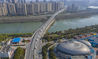 Aerial photo taken on March 17, 2020 shows vehicles taking national emergency medical rescue team members for departure on a street in Wuhan, central China's Hubei Province. Members of 15 national emergency medical rescue teams departed Hubei Province on Tuesday as the epidemic outbreak in the hard-hit province has been subdued. (Xinhua/Cai Yang)