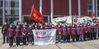 National emergency medical rescue team members from Huashan Hospital of Fudan University in Shanghai gather in front of a temporary hospital in Wuhan, central China's Hubei Province, March 17, 2020. Members of 15 national emergency medical rescue teams departed Hubei Province on Tuesday as the epidemic outbreak in the hard-hit province has been subdued. (Xinhua/Cai Yang)