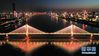 3月18日晚，武汉长江二桥上打出“逆行出征”的字样（无人机照片）。新华社记者 陈晔华 摄