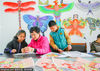 Students in Rugao, East China's Jiangsu province, learn the basics of kite-making, a historical cultural heritage, on March 29, 2020. [Photo/sipaphoto.com]