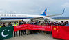 A China Southern Airlines chartered plane carrying materials for Pakistan's fight against the novel coronavirus and a medical team arrives in Islamabad on March 28. DUAN FEI/FOR CHINA DAILY