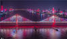 2020年4月6日，夜色下的湖北武汉长江二桥灯光秀画面中，“中国担当”“英雄之城”“武汉重启”“不负春天”“感谢有您”等字幕令人心潮澎湃，一座英雄的城市正在有序重启。赵广亮/IC photo 
