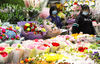 Customers purchase flowers in Changchun, Northeast China's Jilin province, May 8, 2020. [Photo/Xinhua] 