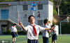 5月22日，河北省邯郸市邯山区开元小学的学生们在练习抖空竹。 郝群英/IC photo
