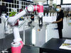 2020年7月9日，2020世界人工智能大会云端峰会在上海世博中心开幕。世博中心一层设置了智能机器人区域，展示智能积木编程机器人、服务机器人等AI产品。