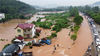 7月10日，泰和县澄江镇黄岗村，水位暴涨淹没了农田村庄，道路通行受阻。