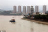 2020年7月11日拍摄的长江湖北宜昌葛洲坝水利枢纽下游水域。图为货船行驶在江中。
