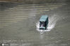 7月2日午间雨势猛然加大，暴雨预警不断升级，13时30分武汉市气象台紧急拉响暴雨红色预警，100毫米以上大暴雨。图为汉口一路段出现渍水。张牧之/IC photo
