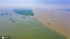 2020年7月6日13时，长江湖口站水位19.73米，较19.5米的警戒水位超0.23米，长江与鄱阳湖水体面积在持续扩大，江西省九江市湖口县长江岸线树木被淹。