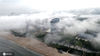 2020年8月10日，航拍山东省荣成市海滨和南部石岛山、赤山、槎山风景区出现美轮美奂的平流雾景观。