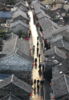 Stretching over the Yangtze River, the 1,092-meter bridge is an engineering marvel to behold. Almost everyone in the carriage was taking photos of the bridge.Dongguan Street is known for its well-preserved architecture, narrow lanes and wide selection of shops. CHINA DAILY