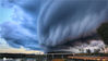 2020年8月11日，黑龙江省伊春市，铁力市呼兰河畔，一场暴雨在云中蕴酿，乌云翻滚，碾过天际，场面震撼。
